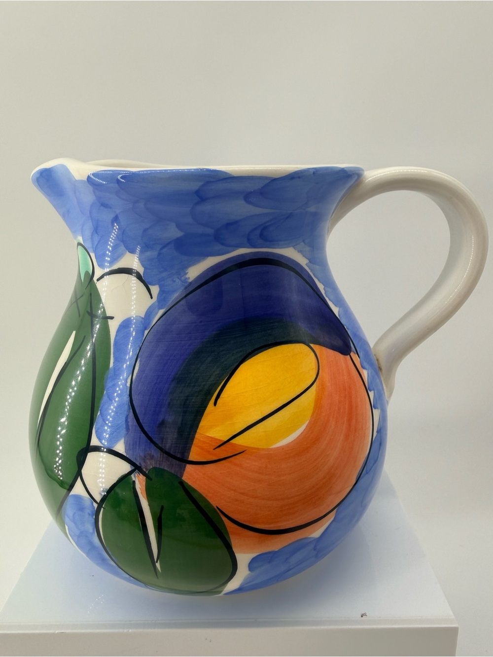Hand-Painted Ceramic Pitcher in Blue with Orange and Green Motif